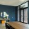 lobby with conference table and chairs at The Winnie Uptown Chicago Apartments